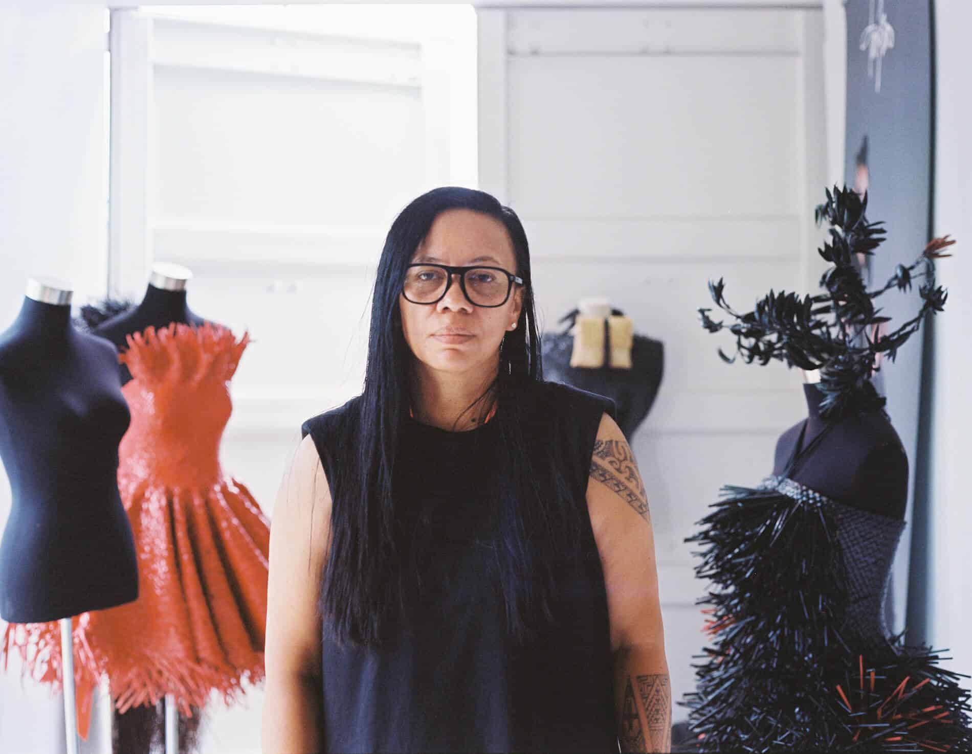 Image of a woman sitting in her studio