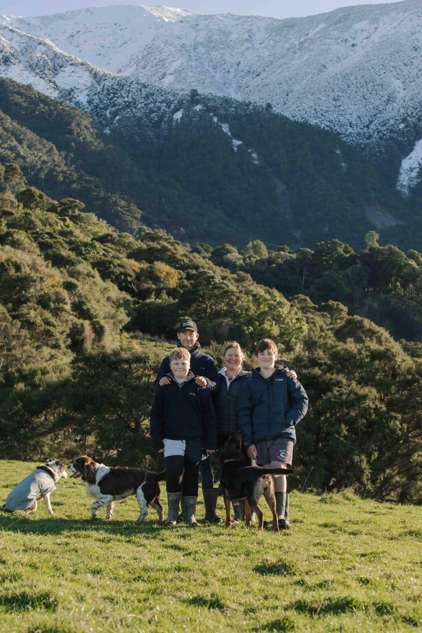 Justine with her husband, Barry, and children Jack and Toby. “I like that I’m still able to help
on the farm, when we’re shearing and lambing or there’s other things going on,” Justine says. “The
gin side of things is a little bit slower during winter and that’s when I can concentrate on being a
mother, wife and farmer, as the gin consumes me a lot over spring and summer. I take the kids out
picking botanicals whenever I can. The three of us down the creek with our ice cream containers,
picking borage – all the individual little blue flowers.”