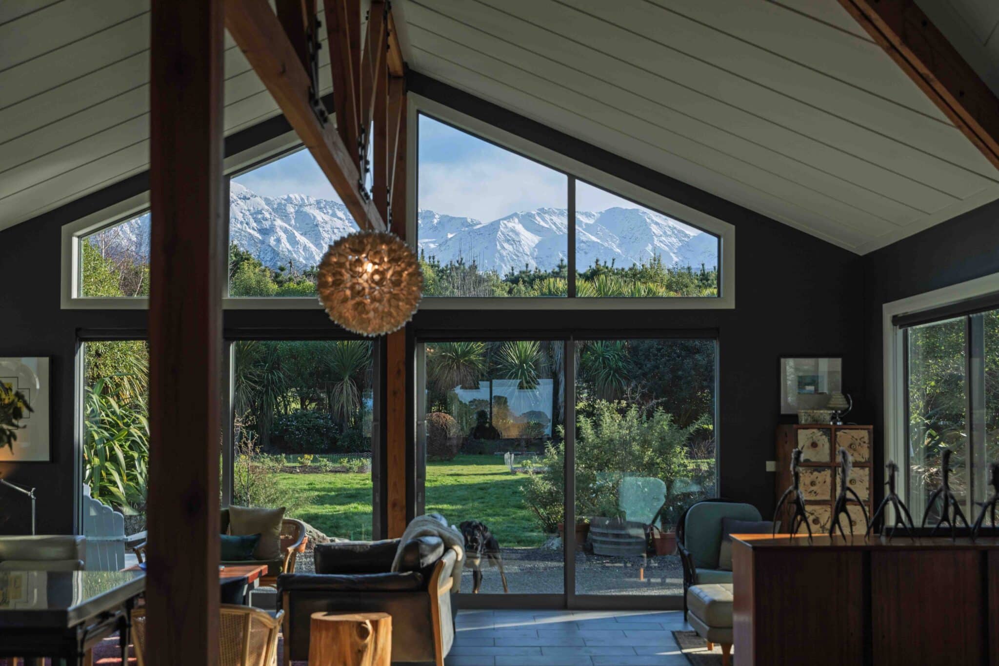 "We wanted to keep the integrity of the outside of the house, while also creating
a kind of reveal when you walk in through the front door. We kept the original footprint, but we added
on and changed the roofline to take advantage of the beautiful view towards the mountains.”