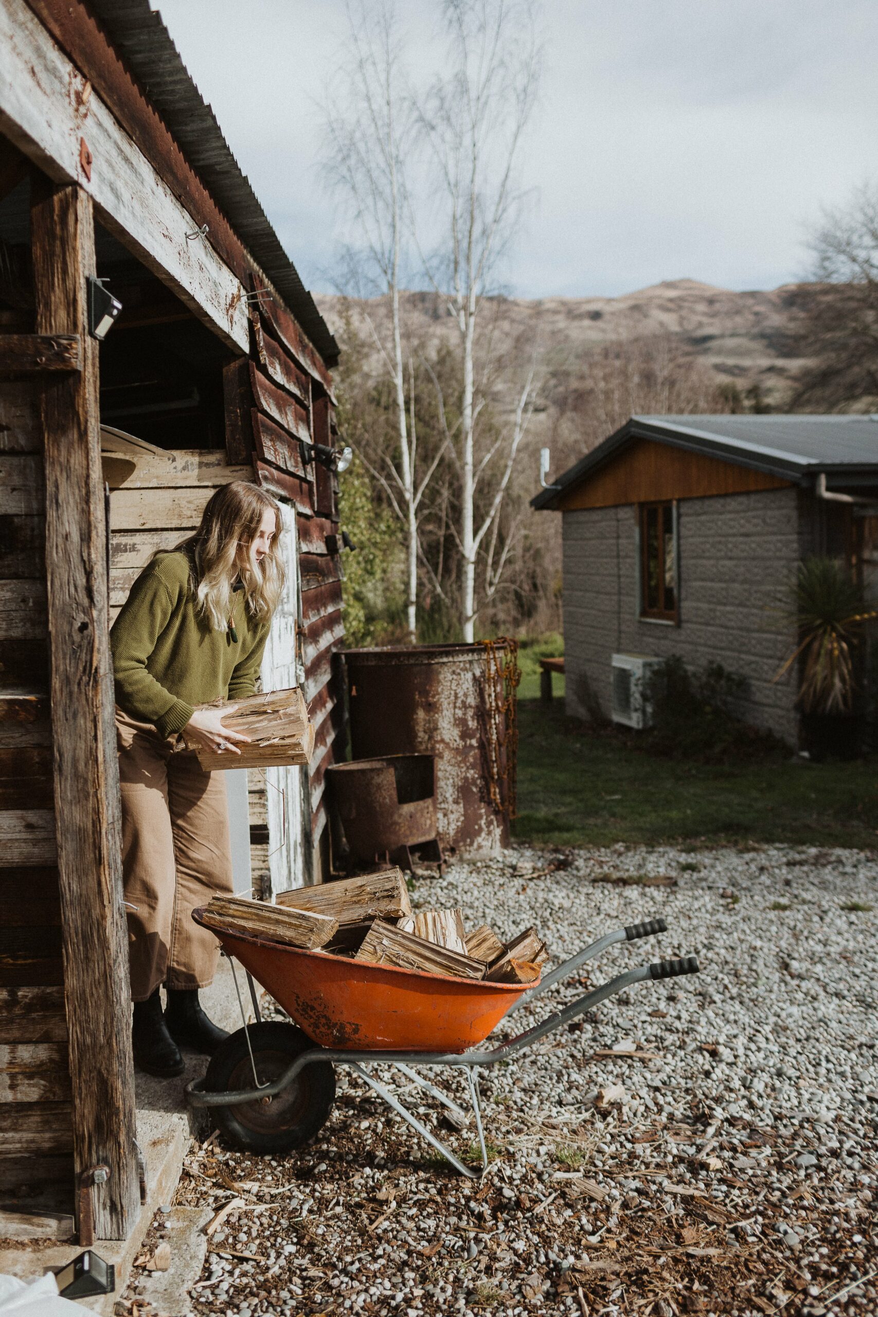 Zoe collecting firewood