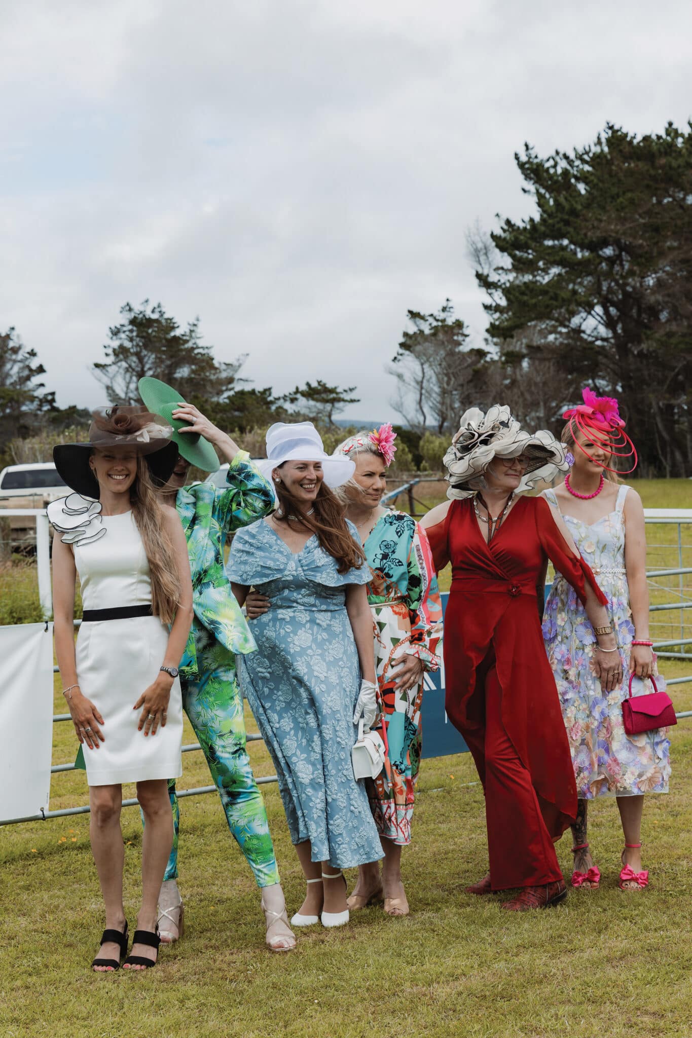 Above. The annual races are an important event in the island’s social calendar, an opportunity for people to dress up, including jockey Tiffany McClunie, 30, far left. “I took off my silky racing shirt, ran inside with my little go bag and quickly changed into the outfit I had already picked out. I still had a mark from my racing boots across my calf. I didn’t want to miss out on dressing up – it’s not very often you get to put on your full frock and dress up with the ladies!”