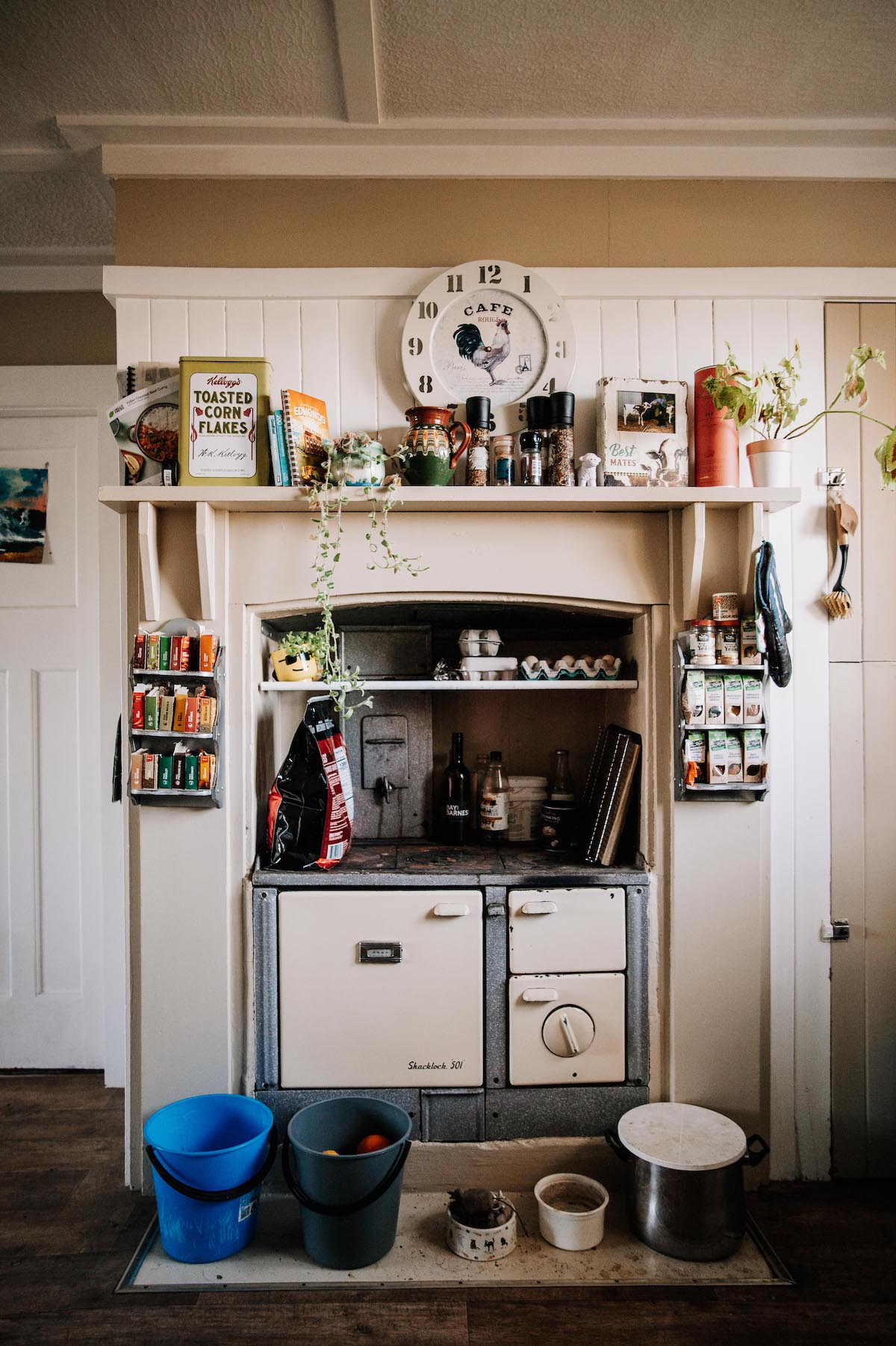 Kitchen inside a farmhouse with an old wood stove.