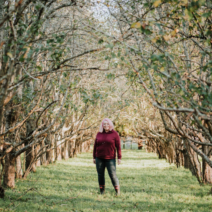 Nikki in her pear orchard