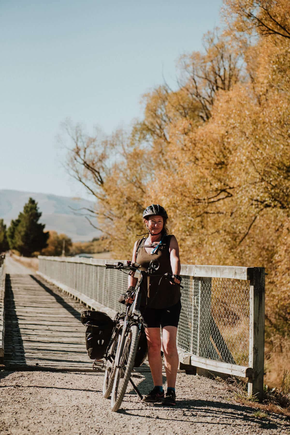 Michelle and her bike on the Otago Central Rail Trail.