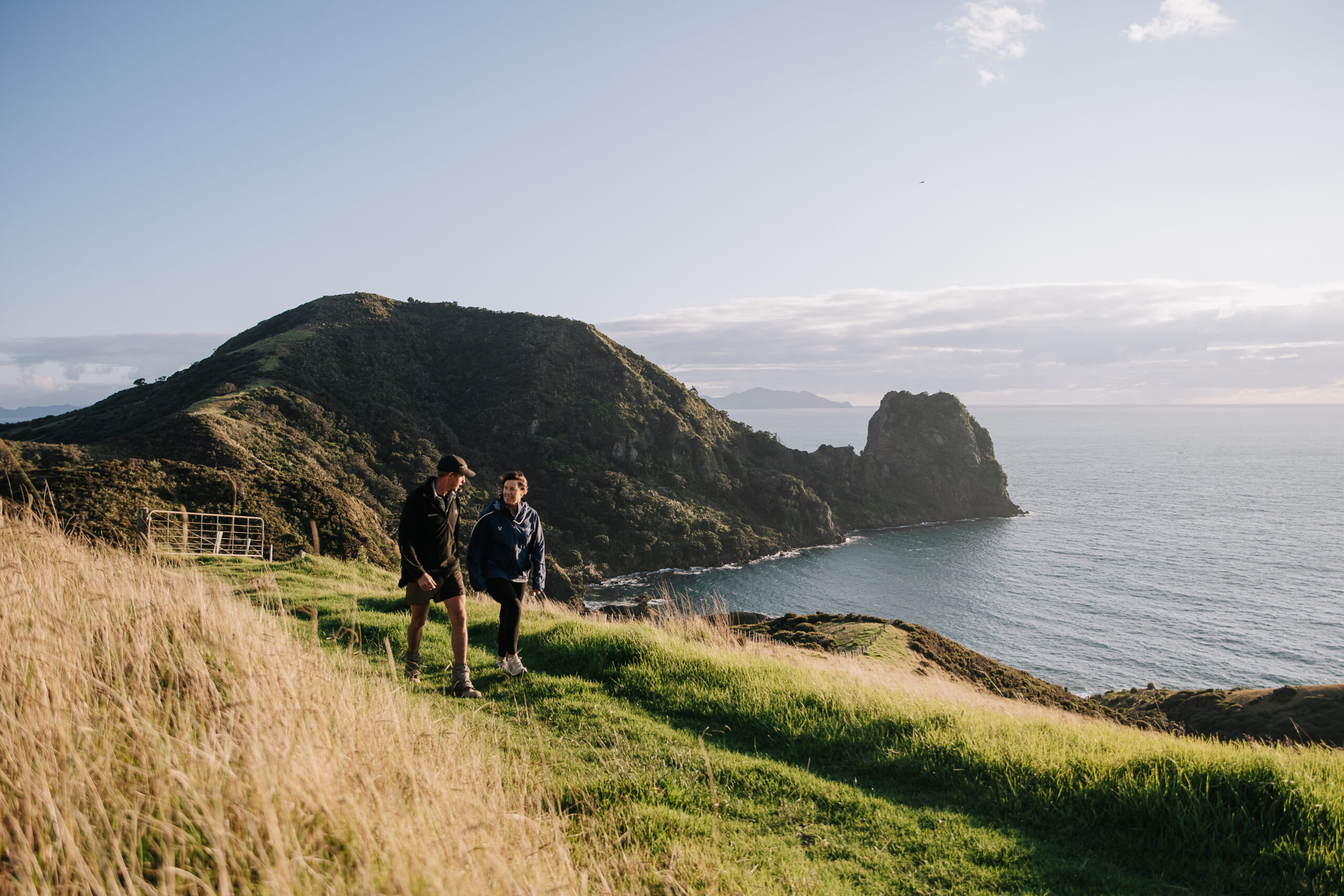 Above. Zander and Cath with the view to Aotea Great Barrier Island
from the track. “It’s a beautiful place,” says Cath. “It’s got a good
climate. There’s lots of recreation on our doorstep. The sea’s right
there; there’s a river; and then there’s the farm – a great place to
raise your children."