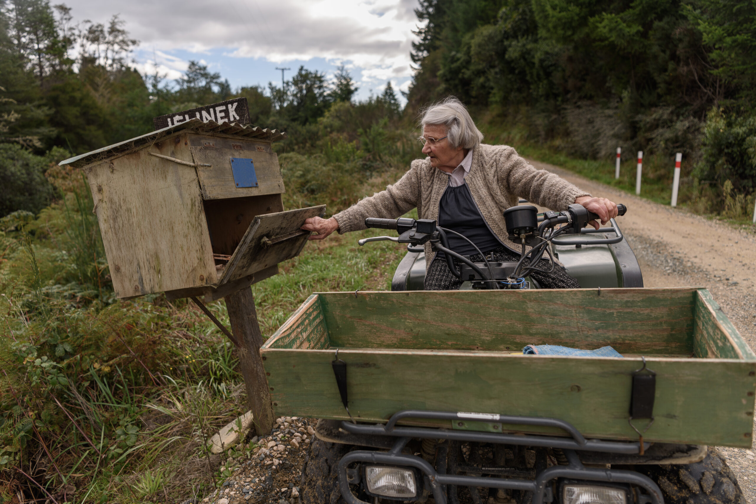 Erica uses her quad bike to get down her steep driveway to the letterbox. 