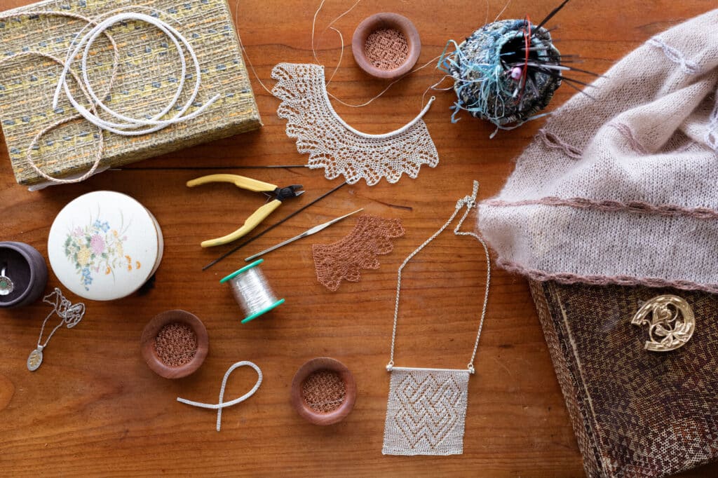 Assorted knitting and crafting tools and materials