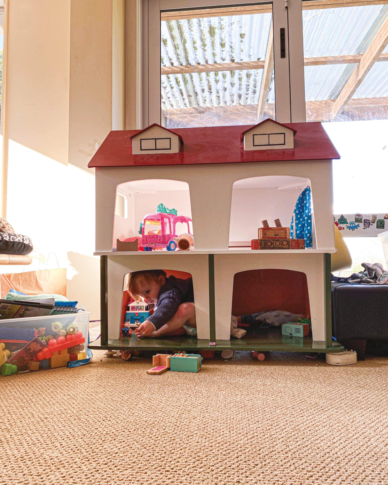 Above. Willoughby plays house in the doll’s house made by her great-grandfather.