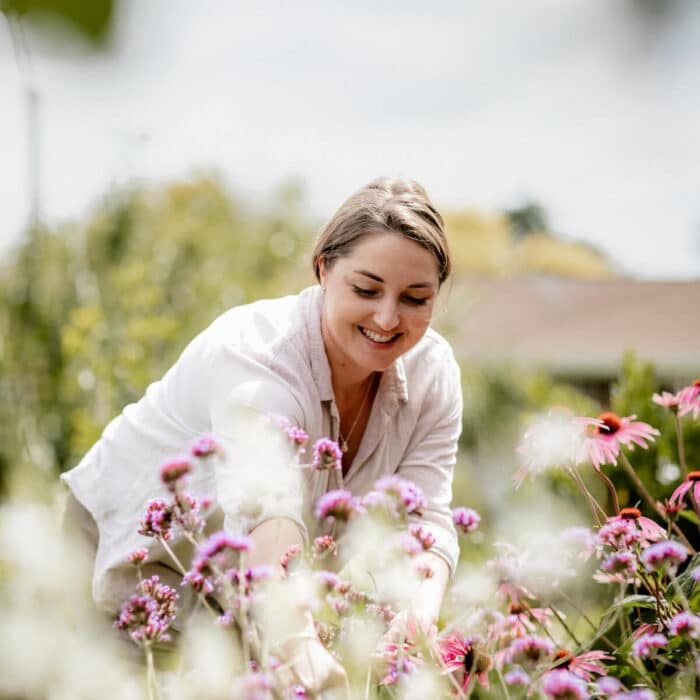 Woman tends to her garden
