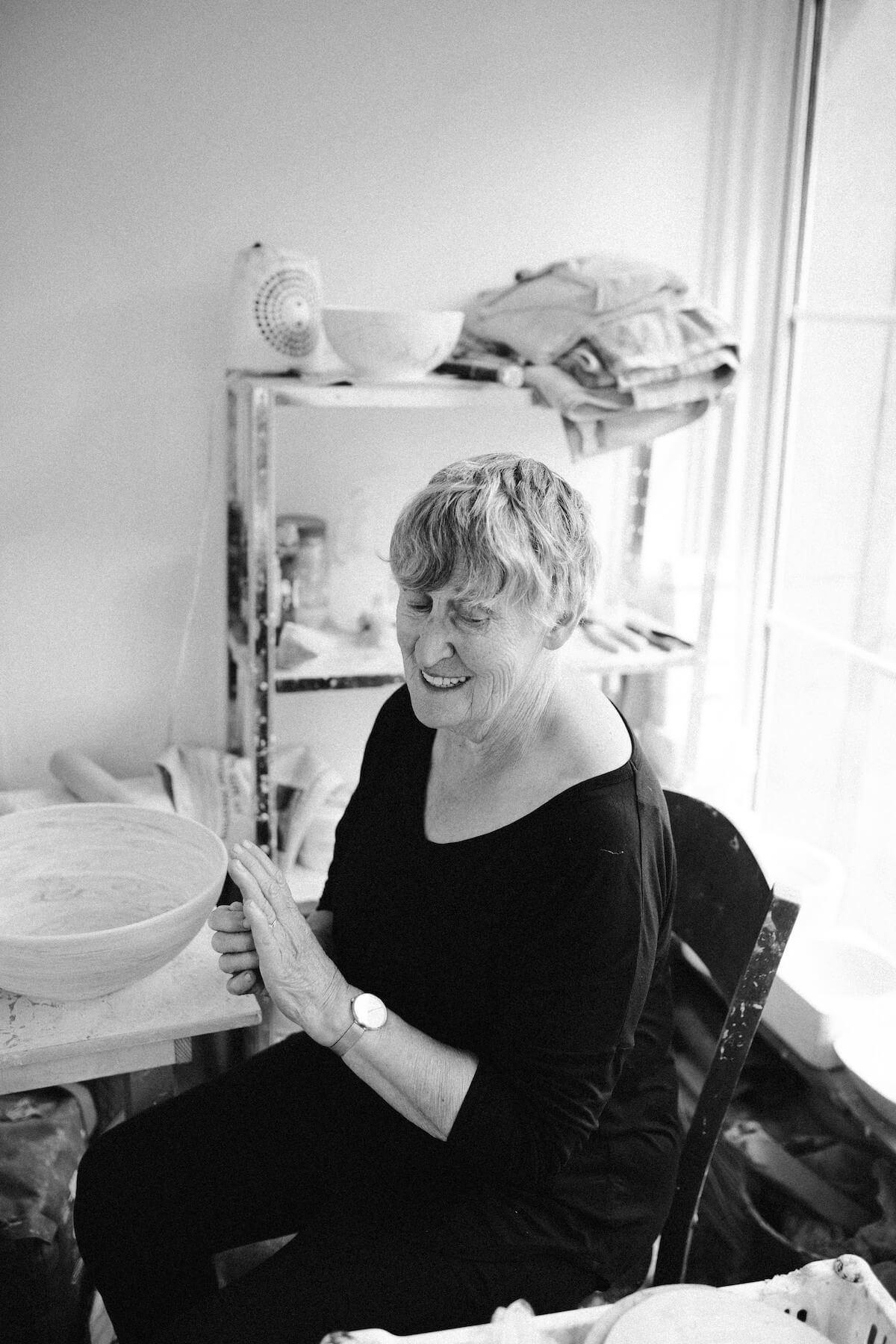 Black and white photo of a female potter