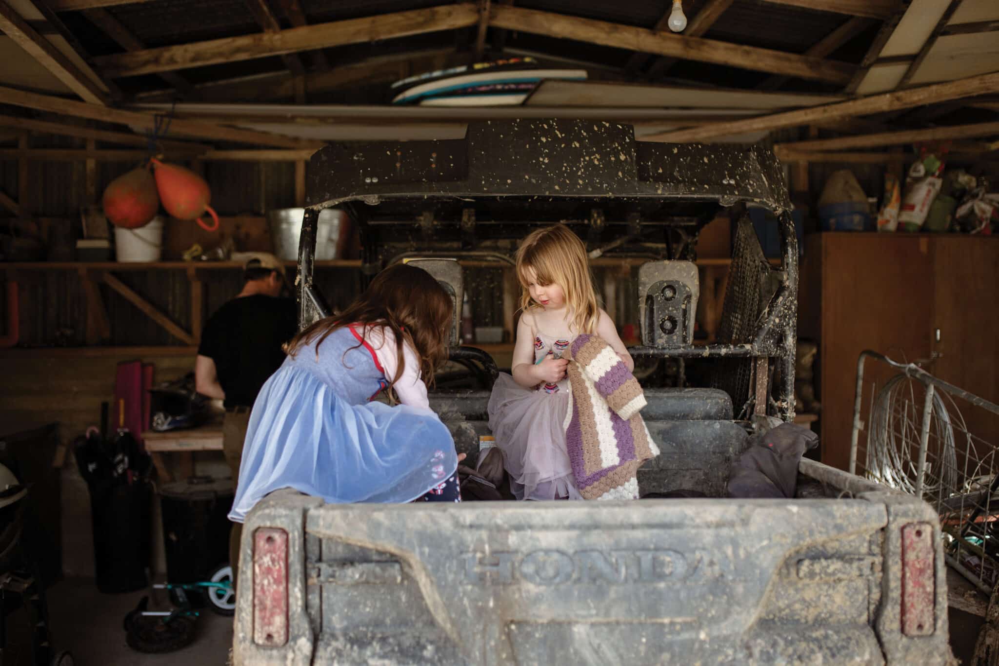 Above. Ada and Grace play in the shed. “I guess it’s just like our turn, because our grandparents lived here and then Mum and Dad lived here and now it’s our turn,” Jenny says. “And will our kids, or one of our kids, come back here? I don’t know…
as long as they’re doing what makes them happy, that is the main thing. But it’s important to do our best for this place.”