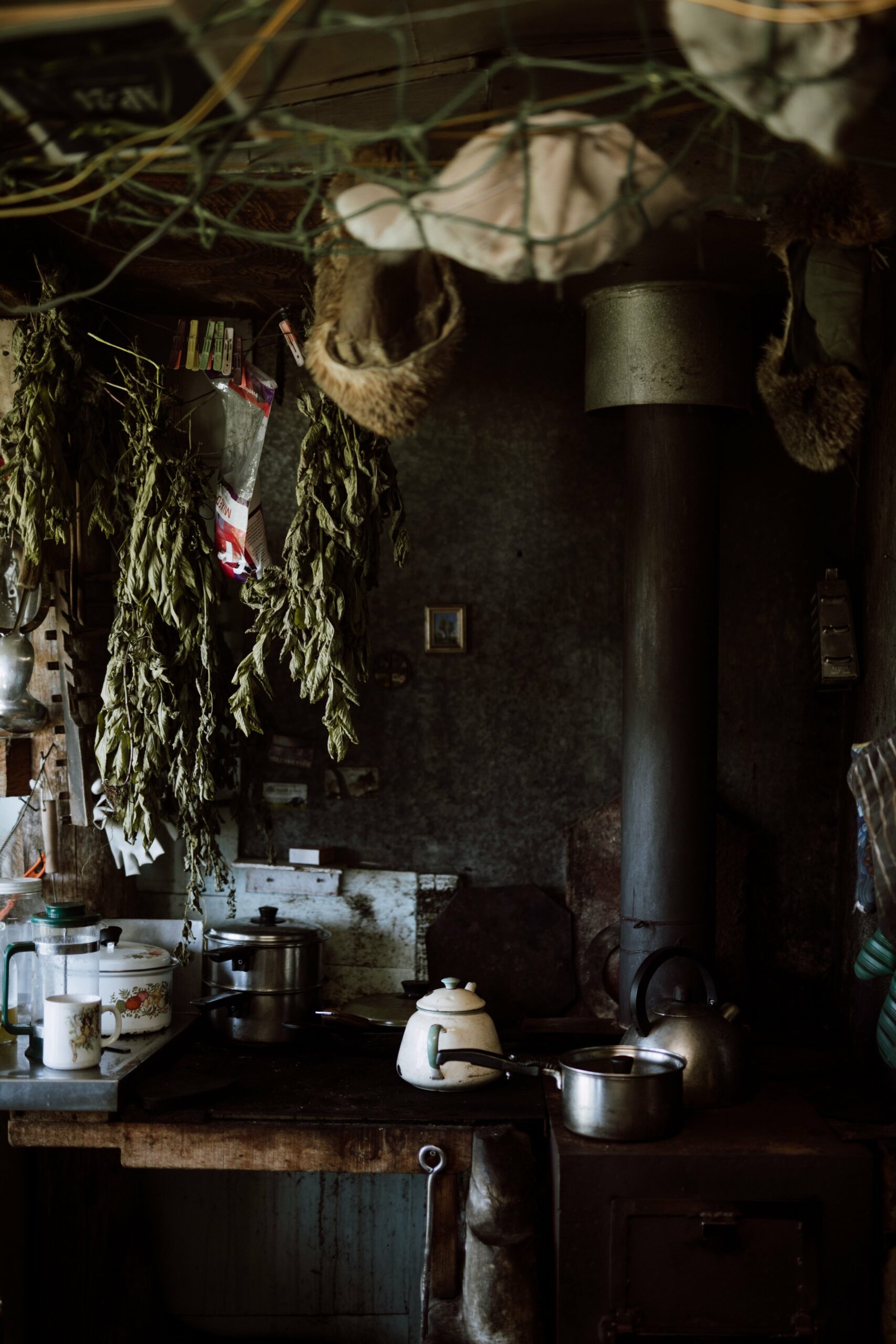 The smell of spices fills the room as Catherine places a homemade cake on the table. The kettle is boiling; mint leaves are hanging to dry from the ceiling. "Christan loves his mint tea," Catherine says while smiling at her husband.
