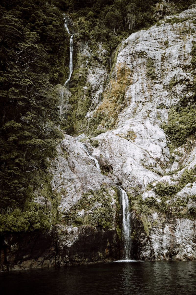 A dramatic waterfall cascading down the rocks.
