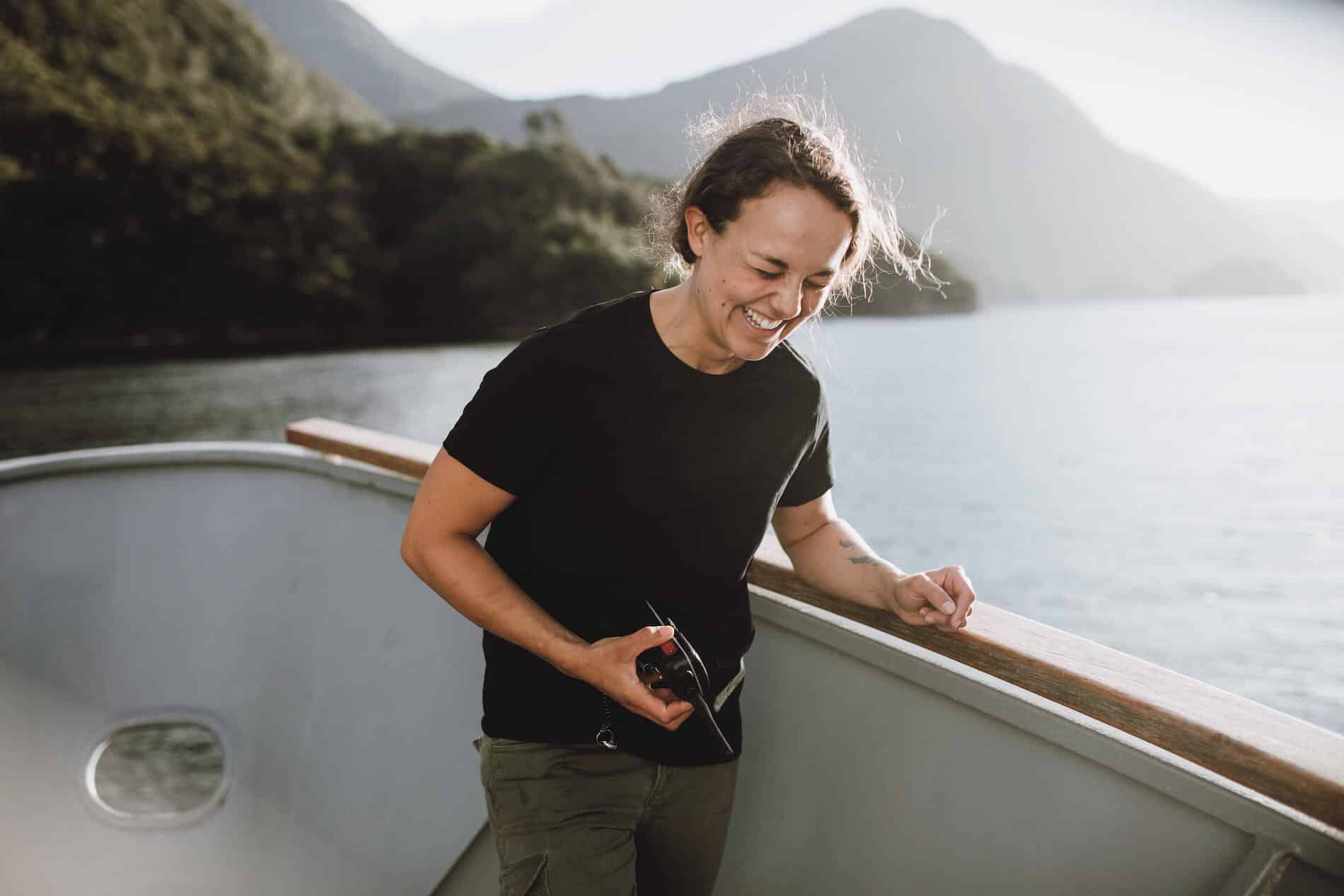Woman laughing on a boat
