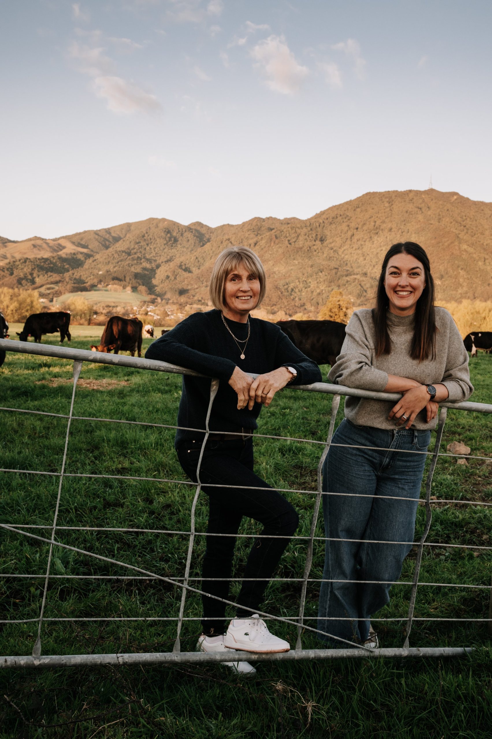 Robyn and Jana on a farm gate