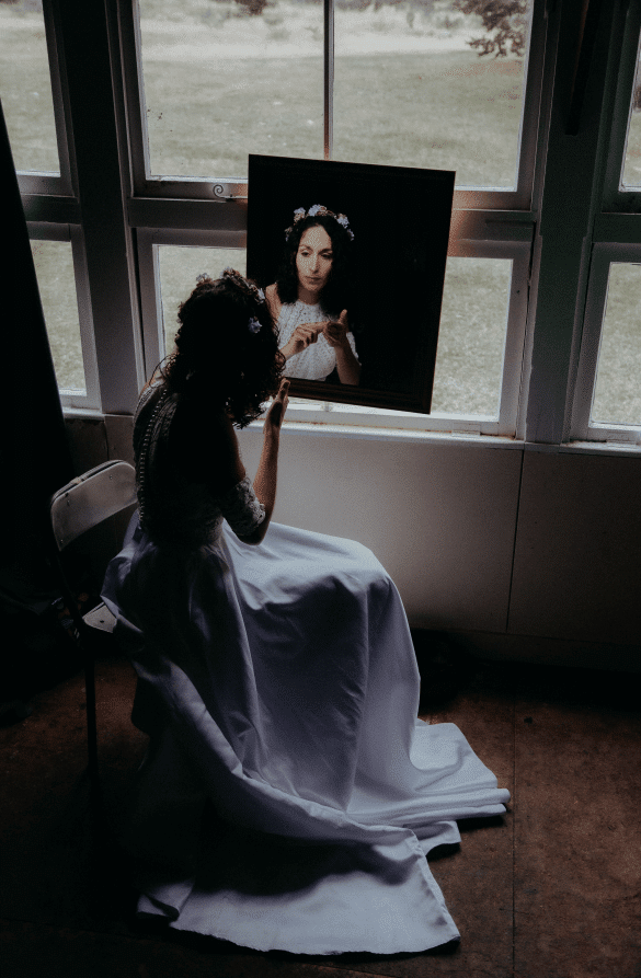 Myriam getting ready. “I had no hair dryer and no electricity and as we were a two hour drive from Christchurch, I couldn’t get to a hairdresser or anything. I don’t like that sort of thing anyway and I don’t like makeup either, so we did it all
ourselves,” she says.