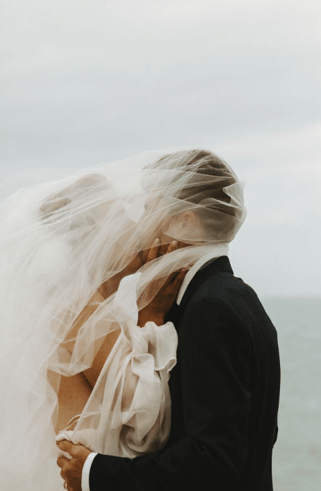 Above. Abby’s veil billowing in the
breeze. “The weather was classic Wairārapa
wild!” Abby says. 