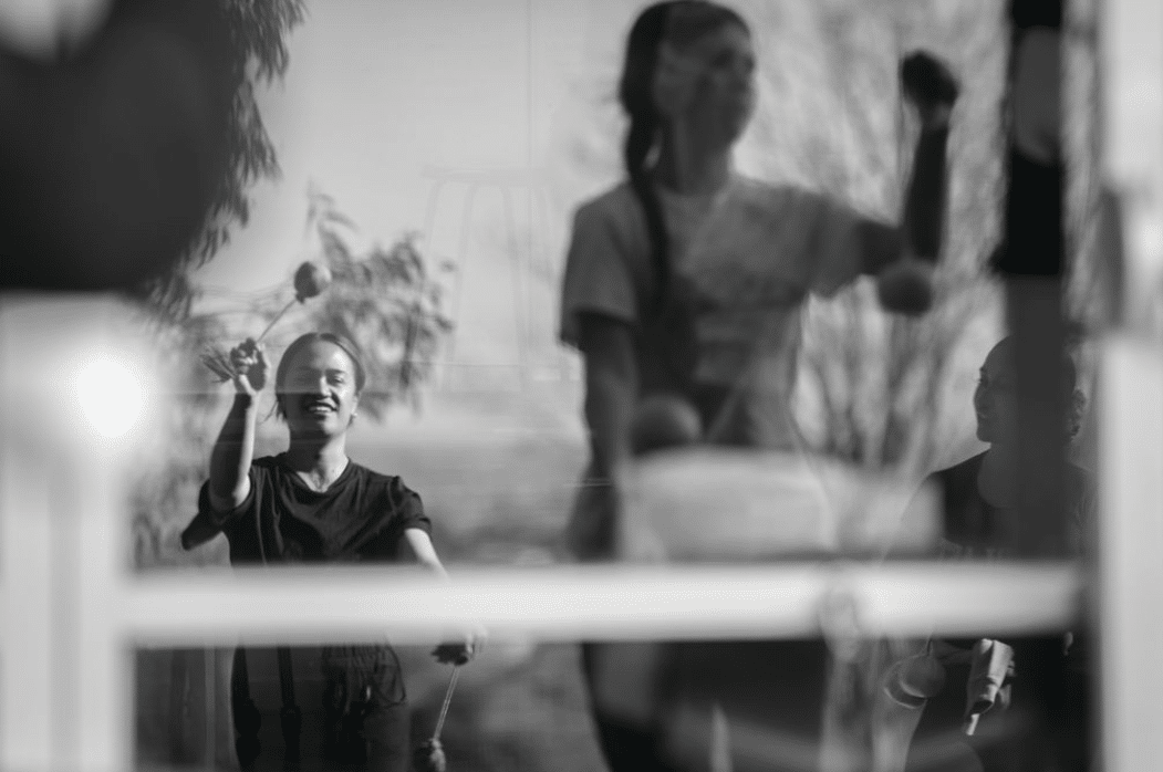 Groups practise using window
reflections to fine-tune their movements.