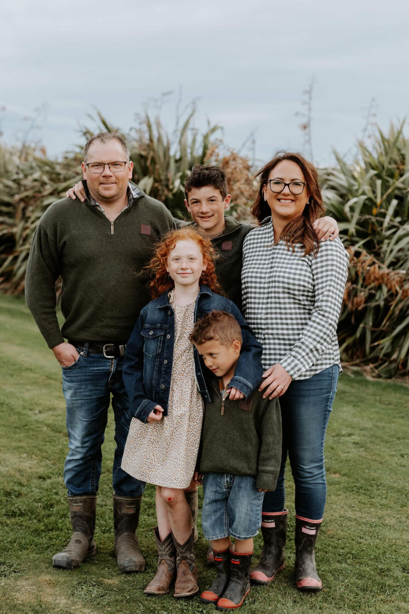 Tracey and Jonny and their three kids on their farm.