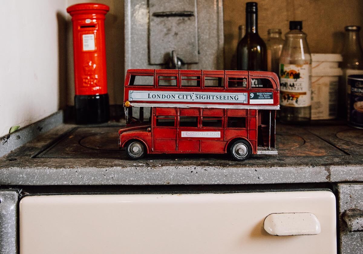 A toy red London doubledecker bus as a reminder of home for Charlotte.