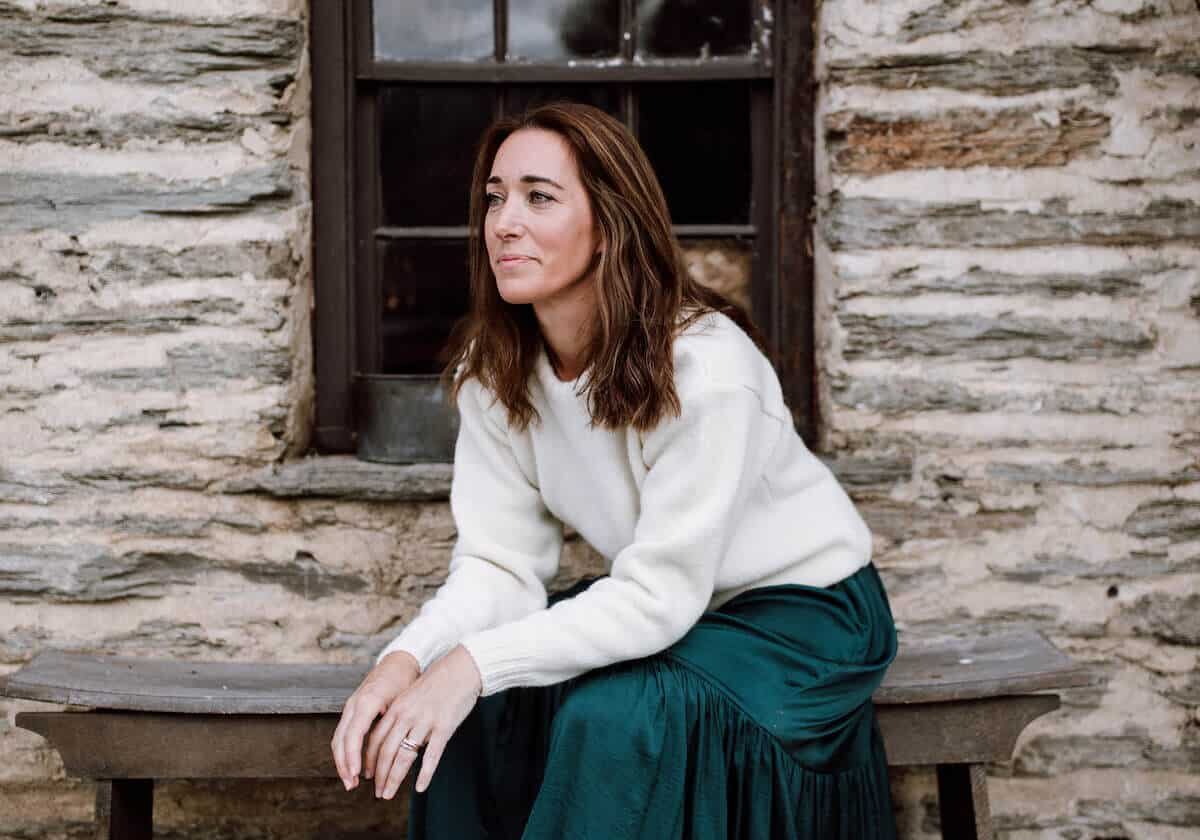 Woman sitting on bench seat
