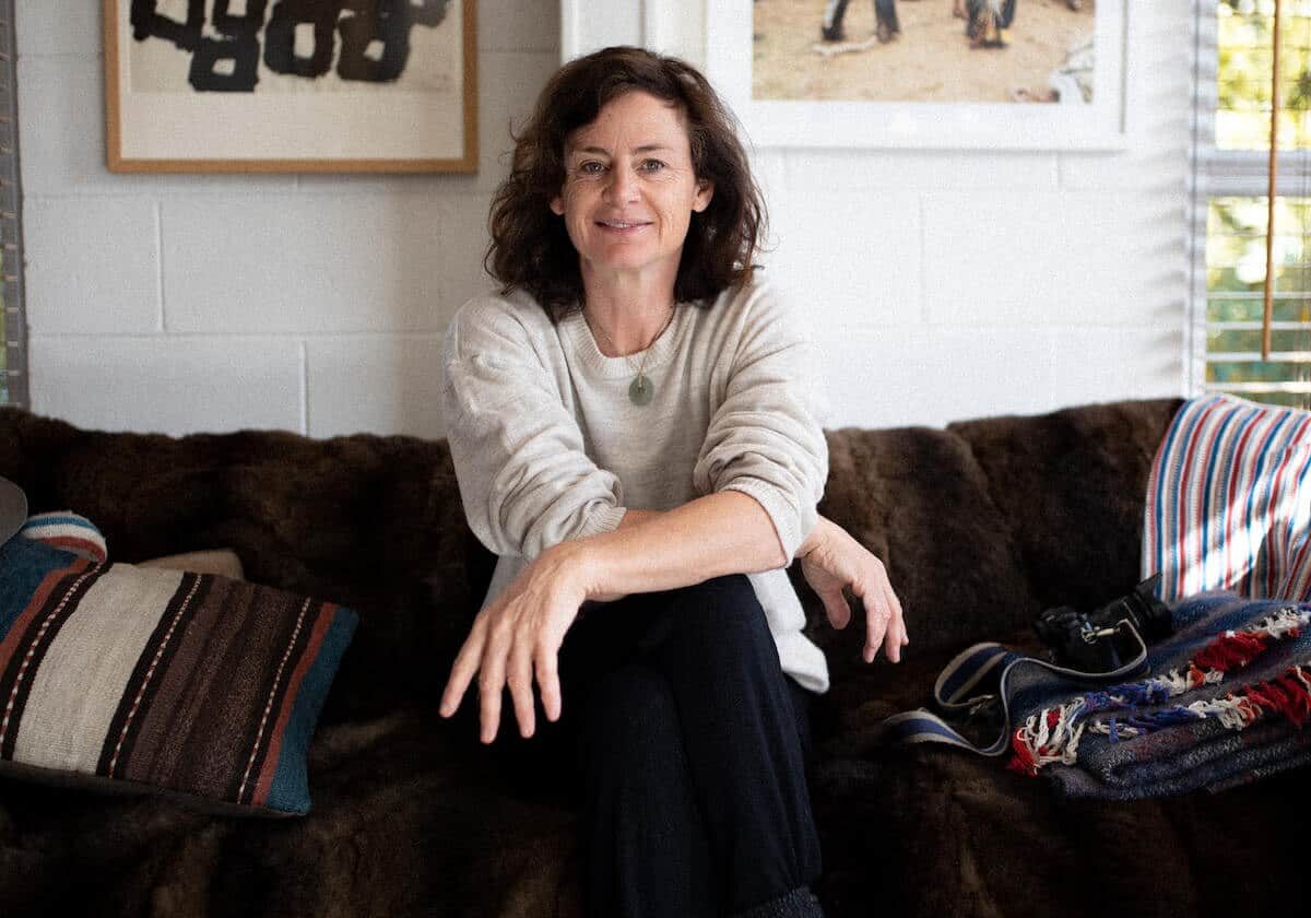 Woman sitting on her couch