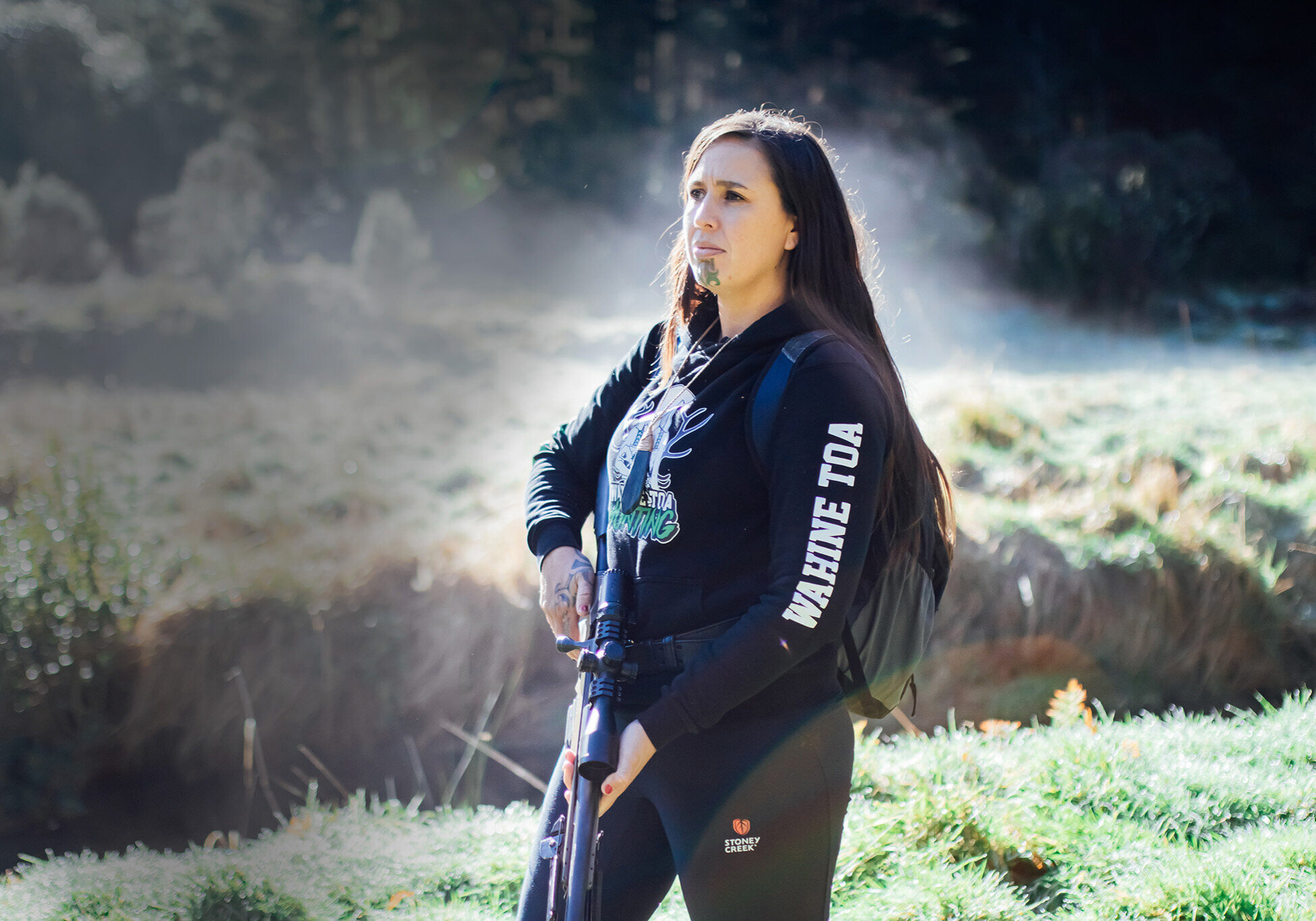 Pania Marsh holding a gun